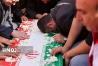 تشییع پیکر هفت شهید گمنام دفاع مقدس در کرمانشاه همزمان با سالروز شهادت حضرت زهرا(س)